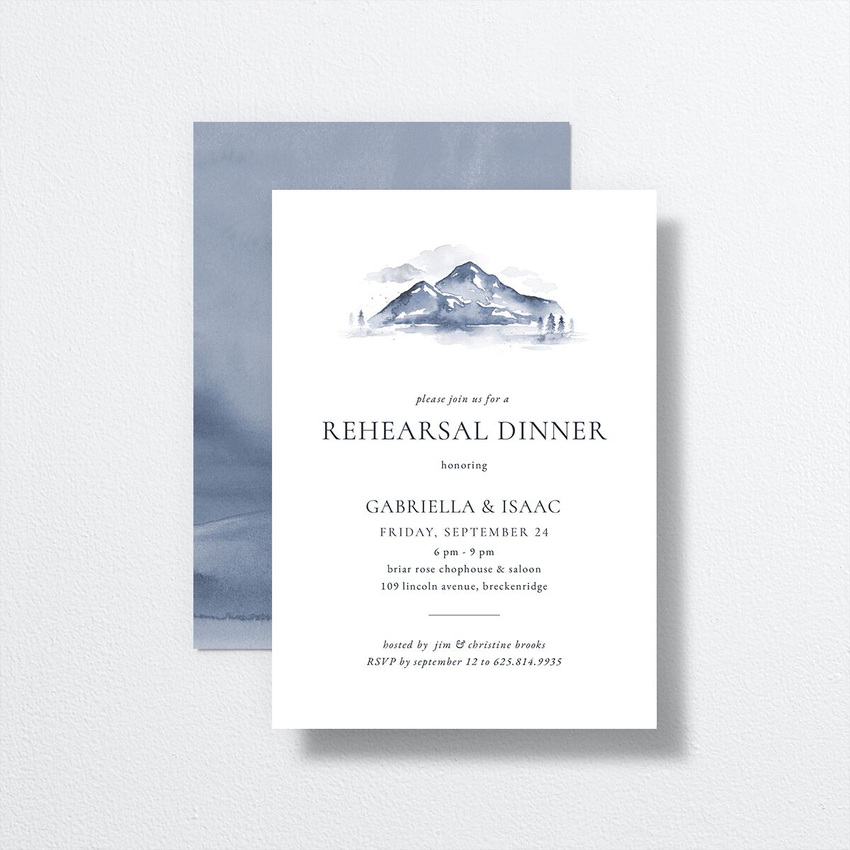 Watercolor Mountains Rehearsal Dinner Invitations front-and-back in blue