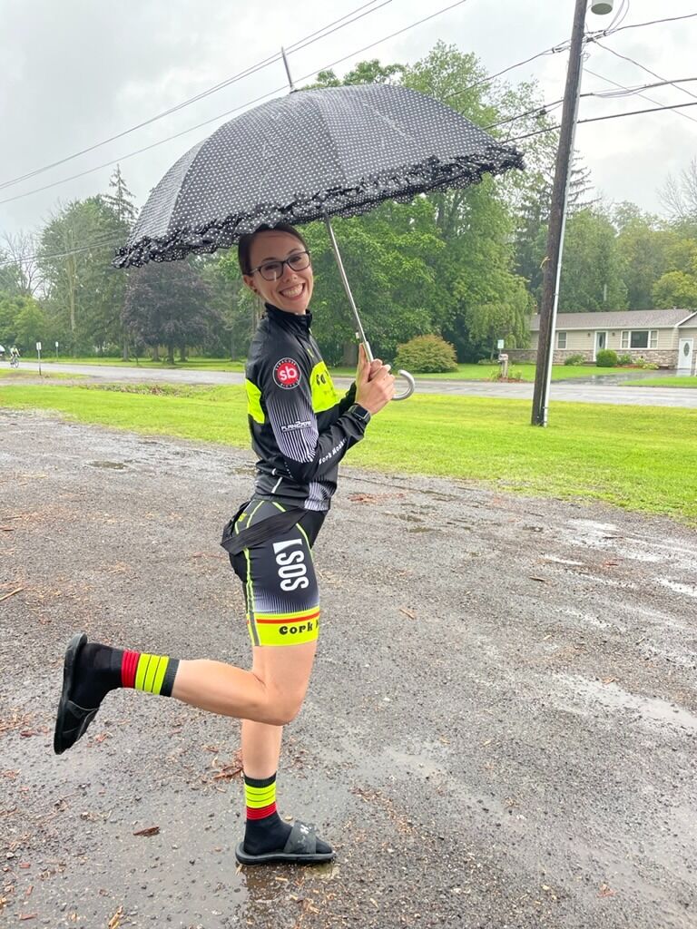 Lindsey with her Umbrella at Plan2Peak because it was a MONSOON during her race. But, of course was a bright sunny day during Josh's ;)

For unknown reasons...Lindsey decided to stay and watch a 60+ mile mens race... :)
