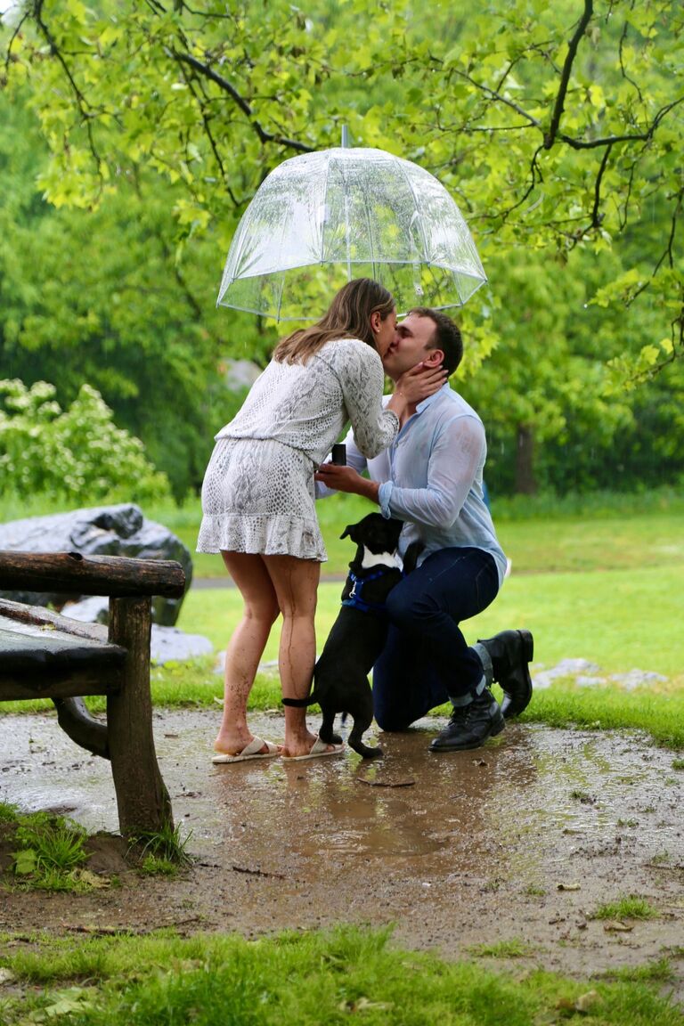 The big moment, the day John got down on one knee in the pouring rain and popped the question. 