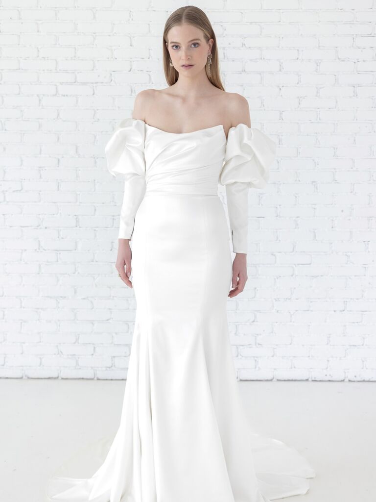 Off the shoulder affordable wedding dress by Watters Designs. 